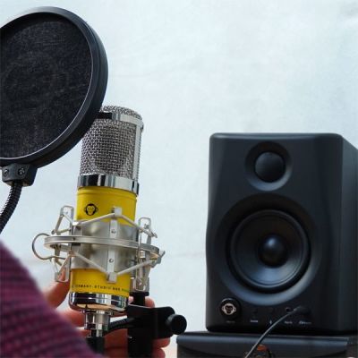 5. Monkey Banana Hapa Yellow Table Microphone