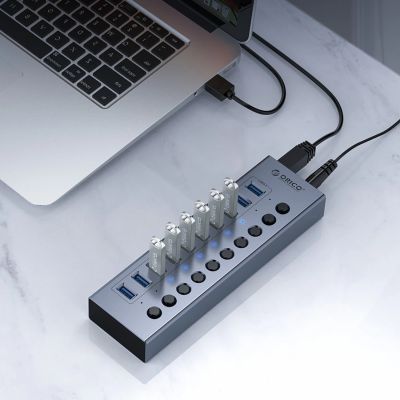 4. Orico BT2U3-16AB Hub 16x USB-A 3.0 with switches - gray