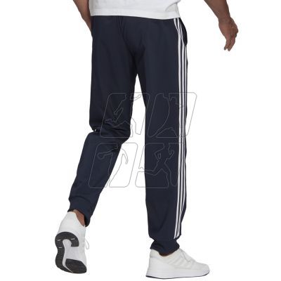 4. Adidas Essentials Tapered Cuff 3 Stripes Pants M GK8981