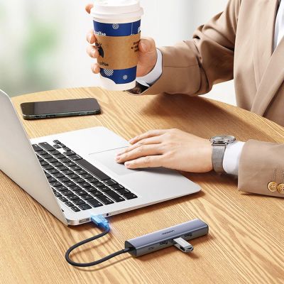 10. Ugreen multifunctional adapter HUB USB 3.0 - 3 x USB / Ethernet RJ-45 / USB Type C PD gray (CM475)