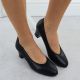 7. Women's leather pumps with a low heel, black Rieker 44650