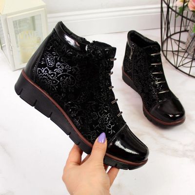 17. Women’s black insulated leather ankle boots with print, Filippo