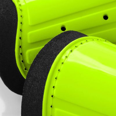 13. Meteor M football shin guards green