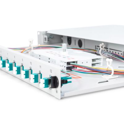 11. FO patch panel with equipment 19'' 1U, 12x LC dx, OM3, pigtails, adapters, trays, sliding, gray