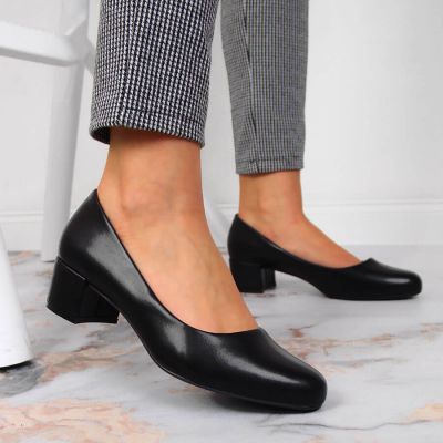 9. Black block heels by Sergio Leone