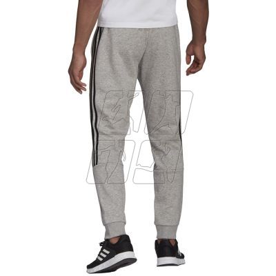 7. Adidas Essentials Tapered Cuff 3 Stripes M GK8976 pants