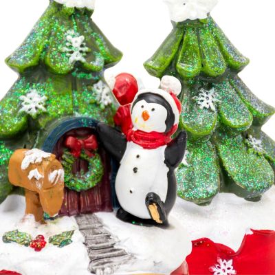 9. PLAYING PENGUIN CHRISTMAS DECORATION