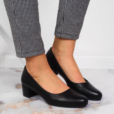 6. Black block heels by Sergio Leone