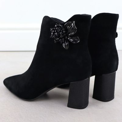 4. Women's leather ankle boots with a decorative heel S.Barski 52-686