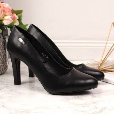 5. Black high heel pumps by Sergio Leone