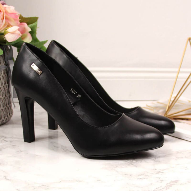 5. Black high heel pumps by Sergio Leone