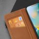 9. Dux Ducis Skin X2 case for iPhone 14 Plus case with magnetic flap brown
