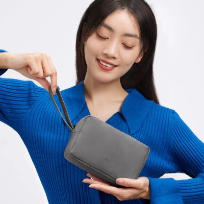 13. Baseus EasyJourney Series small travel bag phone pouch, headphones and other small items gray