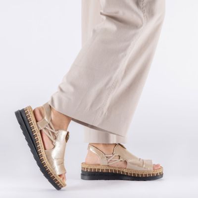 6. Rieker V7972-60 women's gold wedge sandals