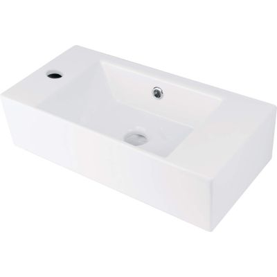 Ceramic countertop washbasin with space for a tap - left