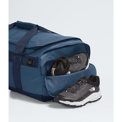 6. The North Face Base Camp Voyager Duffel Bag 62L Recycled Plastic, Thermoplastic Polyurethane Elastomers (TPU) Blue