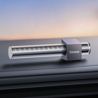 11. Baseus parking plate for the telephone number on the gray dashboard