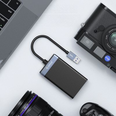 11. Orico CL4D-A3 USB-A 3.0 SD microSD CF MS 5 Gb/s Memory Card Reader - Black and Silver