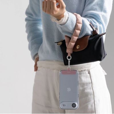 3. Ringke Holder & Puffer Hand Strap Phone Lanyard - Pink