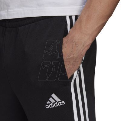 9. Adidas Essentials Tapered Cuff 3 Stripes M GK8831