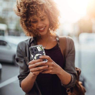 4. Tech-Protect MagMood MagSafe case for iPhone 15 Pro - daisies with leaves