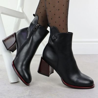 10. Black leather women’s ankle boots with a decorative heel Filippo DBT7363