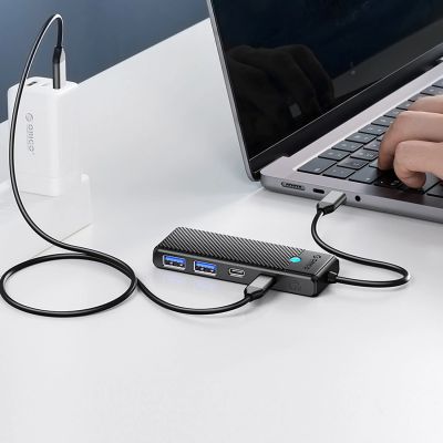 8. Orico PAPW4A-C3 USB-A Hub Docking Station 4x USB-A 3.0 - Black