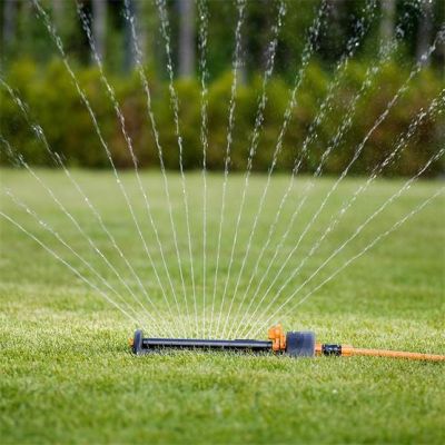 3. Fiskars 1023661 Water Sprinkler Metal Black, Orange
