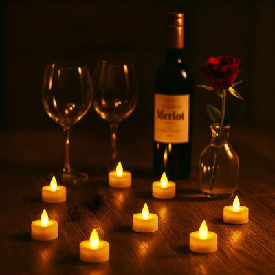 18. SET OF 8 LED TEA LIGHT CANDLES WITH REMOTE CONTROL