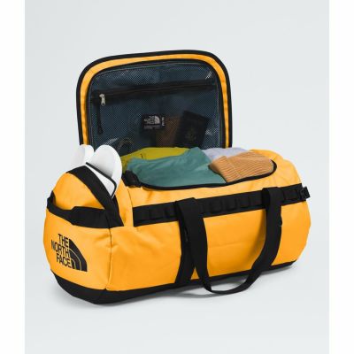 3. Base camp duffel bag m-summit gold-tnf black-npf THE NORTH FACE