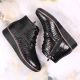 21. Black Insulated Patent Leather Wedge Ankle Boots Filippo