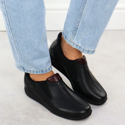 12. Women’s black leather wedge shoes Rieker 47253-00