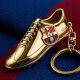 3. FC Barcelona original licensed keychain in the shape of a golden football boot B7084