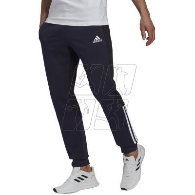 4. adidas Essentials Colorblock Fleece M HK2884 pants