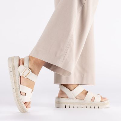 7. Women's beige wedge sandals Rieker V4952-60