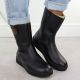 7. Black women’s leather platform ankle boots Rieker Y4355-00