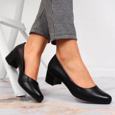 13. Black block heels by Sergio Leone