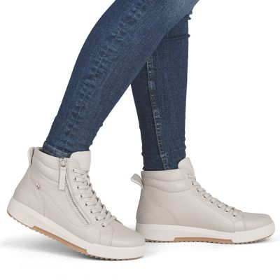 6. Rieker W0164-60 comfortable beige women's leather ankle boots