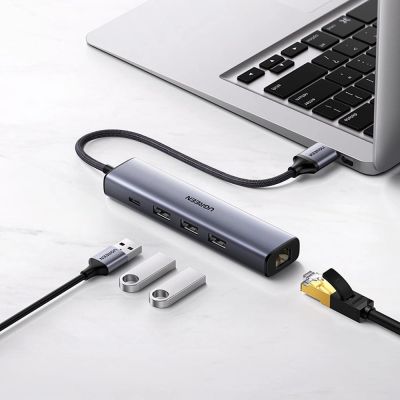 5. Ugreen multifunctional adapter HUB USB 3.0 - 3 x USB / Ethernet RJ-45 / USB Type C PD gray (CM475)