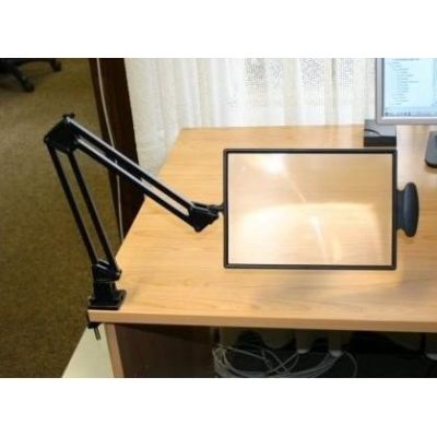 2. Table-top magnifier mounted on a tabletop