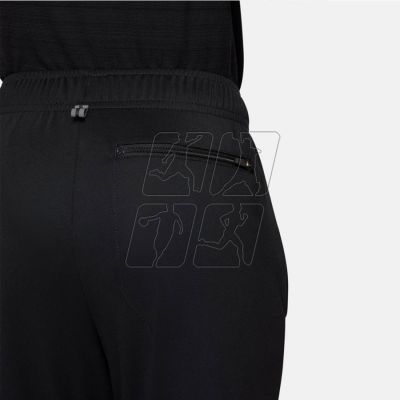 9. Nike Poly Jr Pants DM8546 010