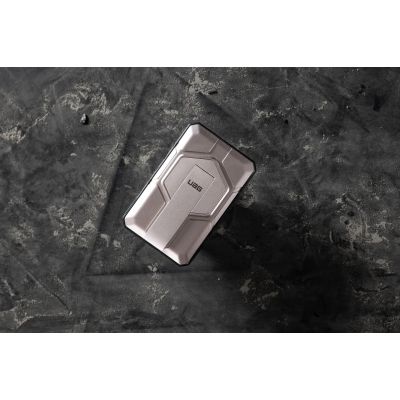 7. UAG Rugged 10K Power Bank – 10000 mAh with Stand, 10 W Wireless Charging, MagSafe Compatible, Cable Included (black/titanium)