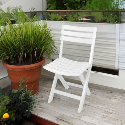 13. SET OF 4 KOMODO PLASTIC FOLDING CATERING CHAIRS WHITE