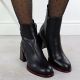 7. Black leather women’s ankle boots with a decorative heel Filippo DBT7363