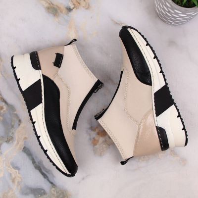 6. Rieker W RKR608 ankle boots beige