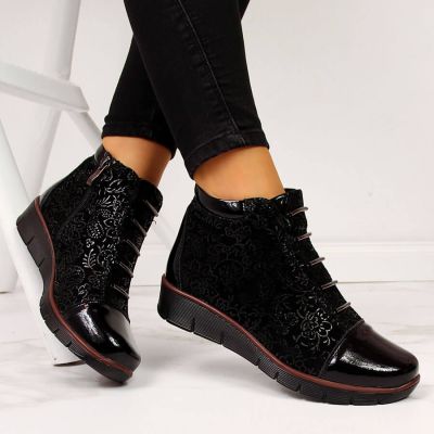 10. Women’s black insulated leather ankle boots with print, Filippo