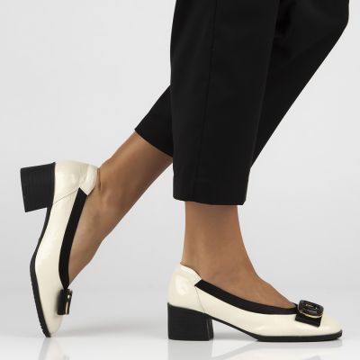 7. Beige patent leather pumps on a block heel Filippo DP6960