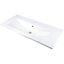 Ceramic recessed washbasin with space for a tap