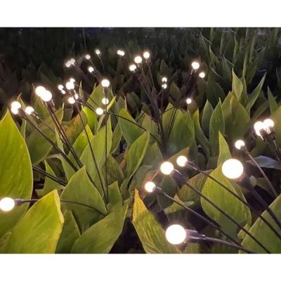 16. SOLAR LAMP DANCING IN THE WIND WHITE BALLS 6 LED 72CM