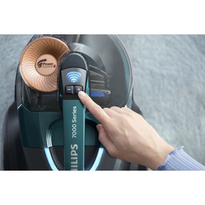 28. Philips FC9744/09 vacuum cleaner (650W; green)